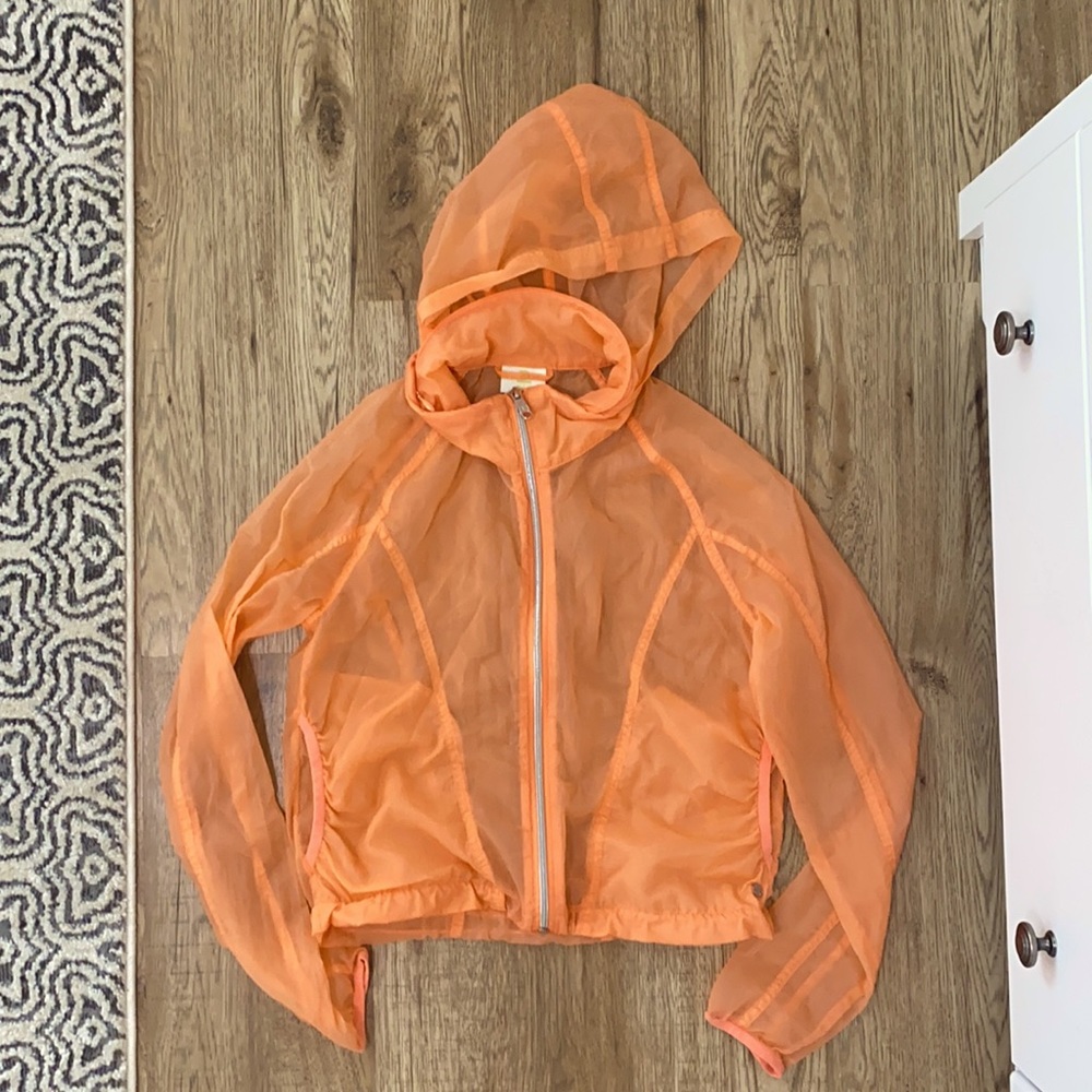 Adidas cropped orange transparent rain coat.